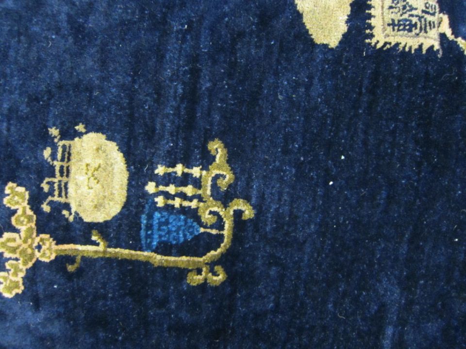 White Knots in 100 year old Chinese Wool Rug